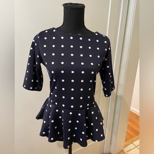 Blue and white polka dot peplum top